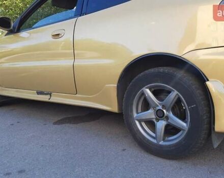 Дэу Ланос 2003 в Запорожье на Automoto.ua Желтый Дэу Ланос, объемом двигателя 1.6 л и пробегом 243 тыс. км за 1700 $, фото 1 на Automoto.ua