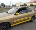 Желтый Дэу Ланос, объемом двигателя 1.6 л и пробегом 300 тыс. км за 2500 $, фото 1 на Automoto.ua