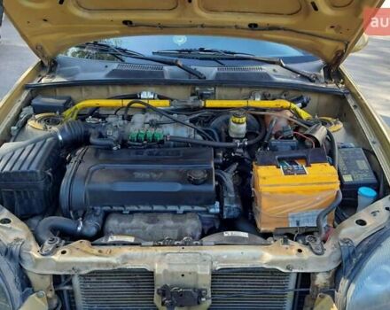 Дэу Ланос 2003 в Запорожье на Automoto.ua Желтый Дэу Ланос, объемом двигателя 1.6 л и пробегом 243 тыс. км за 1700 $, фото 2 на Automoto.ua