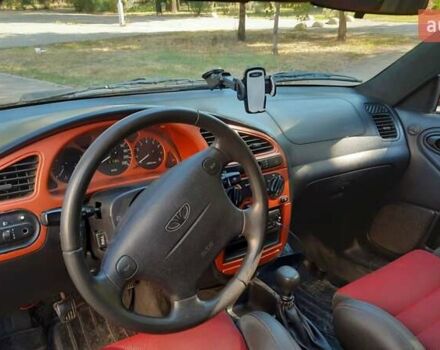 Дэу Ланос 2003 в Запорожье на Automoto.ua Желтый Дэу Ланос, объемом двигателя 1.6 л и пробегом 243 тыс. км за 1700 $, фото 7 на Automoto.ua