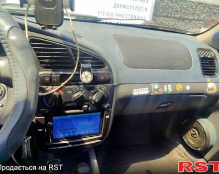 Желтый Дэу Ланос, объемом двигателя 1.5 л и пробегом 320 тыс. км за 2200 $, фото 1 на Automoto.ua