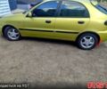 Желтый Дэу Ланос, объемом двигателя 1.5 л и пробегом 320 тыс. км за 2200 $, фото 1 на Automoto.ua