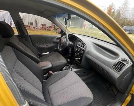 Жовтий Деу Ланос, об'ємом двигуна 1.5 л та пробігом 289 тис. км за 1800 $, фото 3 на Automoto.ua