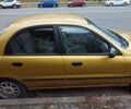 Дэу Ланос 2002 в Киеве на Automoto.ua Желтый Дэу Ланос, объемом двигателя 1.5 л и пробегом 273 тыс. км за 2100 $, фото 1 на Automoto.ua