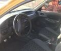 Желтый Дэу Ланос, объемом двигателя 1.5 л и пробегом 113 тыс. км за 1100 $, фото 1 на Automoto.ua