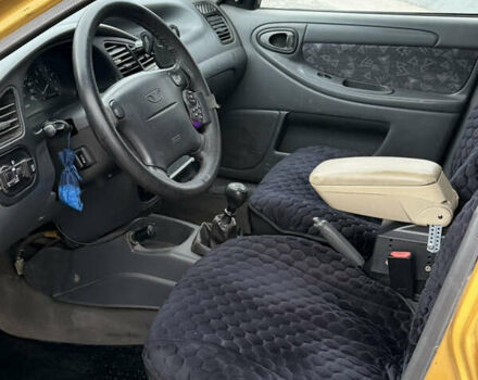 Желтый Дэу Ланос, объемом двигателя 1.5 л и пробегом 167 тыс. км за 2300 $, фото 12 на Automoto.ua