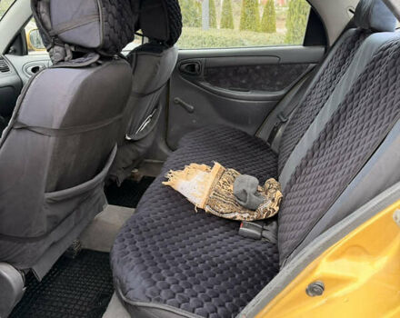 Желтый Дэу Ланос, объемом двигателя 1.5 л и пробегом 167 тыс. км за 2300 $, фото 13 на Automoto.ua