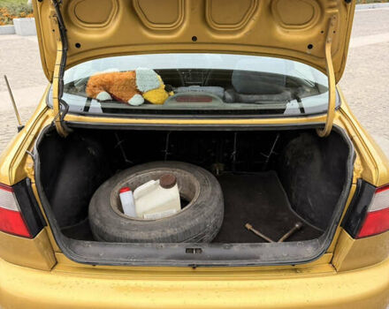 Желтый Дэу Ланос, объемом двигателя 1.5 л и пробегом 167 тыс. км за 2300 $, фото 10 на Automoto.ua