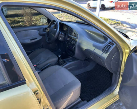 Жовтий Деу Ланос, об'ємом двигуна 1.5 л та пробігом 268 тис. км за 1800 $, фото 9 на Automoto.ua