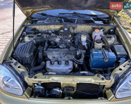 Жовтий Деу Ланос, об'ємом двигуна 1.5 л та пробігом 268 тис. км за 1800 $, фото 13 на Automoto.ua