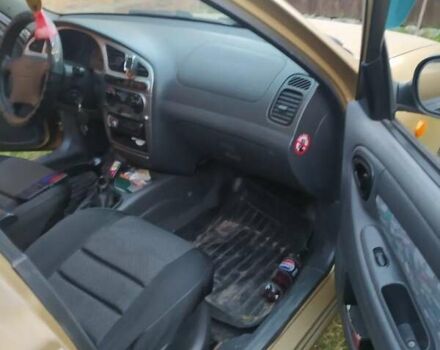 Желтый Дэу Ланос, объемом двигателя 1.6 л и пробегом 265 тыс. км за 2850 $, фото 10 на Automoto.ua