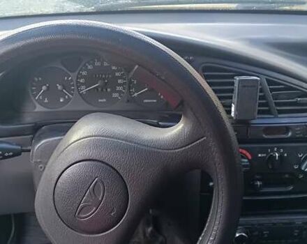 Желтый Дэу Ланос, объемом двигателя 1.5 л и пробегом 272 тыс. км за 2000 $, фото 10 на Automoto.ua