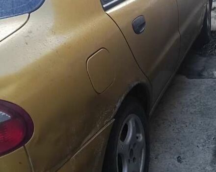 Желтый Дэу Ланос, объемом двигателя 1.5 л и пробегом 272 тыс. км за 2000 $, фото 5 на Automoto.ua