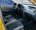 Желтый Дэу Ланос, объемом двигателя 1.3 л и пробегом 240 тыс. км за 750 $, фото 7 на Automoto.ua