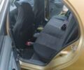 Желтый Дэу Ланос, объемом двигателя 1.6 л и пробегом 265 тыс. км за 2850 $, фото 3 на Automoto.ua