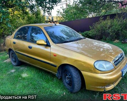 Желтый Дэу Ланос, объемом двигателя 1.5 л и пробегом 450 тыс. км за 1380 $, фото 4 на Automoto.ua