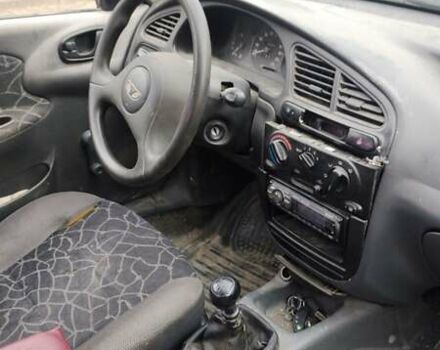 Желтый Дэу Ланос, объемом двигателя 1.5 л и пробегом 90 тыс. км за 1000 $, фото 3 на Automoto.ua