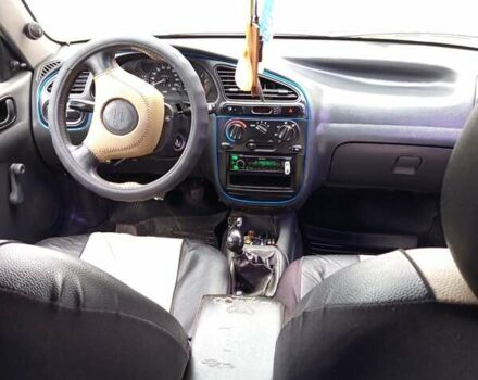 Желтый Дэу Ланос, объемом двигателя 1.3 л и пробегом 245 тыс. км за 2550 $, фото 6 на Automoto.ua