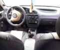 Желтый Дэу Ланос, объемом двигателя 1.3 л и пробегом 245 тыс. км за 2550 $, фото 6 на Automoto.ua
