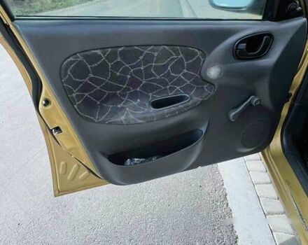 Желтый Дэу Ланос, объемом двигателя 1.3 л и пробегом 200 тыс. км за 1400 $, фото 5 на Automoto.ua