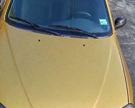 Желтый Дэу Ланос, объемом двигателя 1.5 л и пробегом 272 тыс. км за 2000 $, фото 3 на Automoto.ua