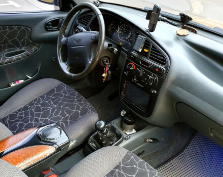Желтый Дэу Ланос, объемом двигателя 1.5 л и пробегом 200 тыс. км за 3350 $, фото 4 на Automoto.ua