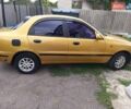 Желтый Дэу Ланос, объемом двигателя 1.3 л и пробегом 245 тыс. км за 2550 $, фото 4 на Automoto.ua