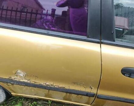 Желтый Дэу Ланос, объемом двигателя 1.5 л и пробегом 90 тыс. км за 1000 $, фото 4 на Automoto.ua