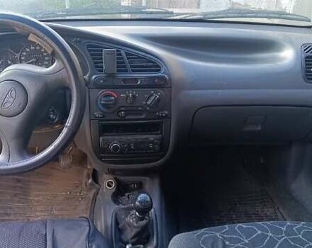 Желтый Дэу Ланос, объемом двигателя 1.5 л и пробегом 272 тыс. км за 2000 $, фото 9 на Automoto.ua