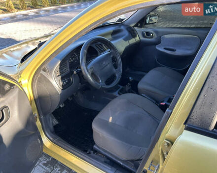 Жовтий Деу Ланос, об'ємом двигуна 1.5 л та пробігом 268 тис. км за 1800 $, фото 8 на Automoto.ua