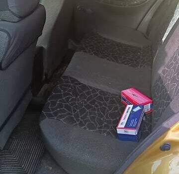 Желтый Дэу Ланос, объемом двигателя 1.5 л и пробегом 272 тыс. км за 2000 $, фото 8 на Automoto.ua