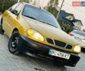 Желтый Дэу Ланос, объемом двигателя 1.3 л и пробегом 240 тыс. км за 750 $, фото 1 на Automoto.ua