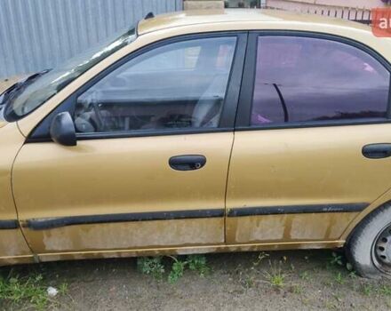 Желтый Дэу Ланос, объемом двигателя 1.5 л и пробегом 90 тыс. км за 1000 $, фото 2 на Automoto.ua