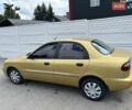 Желтый Дэу Ланос, объемом двигателя 1.5 л и пробегом 330 тыс. км за 1700 $, фото 2 на Automoto.ua