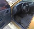 Желтый Дэу Ланос, объемом двигателя 1.5 л и пробегом 272 тыс. км за 2000 $, фото 7 на Automoto.ua