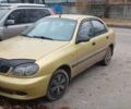 Желтый Дэу Ланос, объемом двигателя 1.5 л и пробегом 140 тыс. км за 1950 $, фото 1 на Automoto.ua