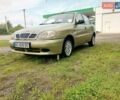 Желтый Дэу Ланос, объемом двигателя 1.5 л и пробегом 215 тыс. км за 1100 $, фото 1 на Automoto.ua