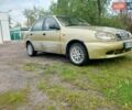 Желтый Дэу Ланос, объемом двигателя 1.5 л и пробегом 215 тыс. км за 1100 $, фото 3 на Automoto.ua