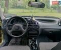 Желтый Дэу Ланос, объемом двигателя 1.5 л и пробегом 215 тыс. км за 1100 $, фото 15 на Automoto.ua