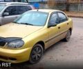 Желтый Дэу Ланос, объемом двигателя 1.5 л и пробегом 140 тыс. км за 1800 $, фото 1 на Automoto.ua