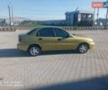 Желтый Дэу Ланос, объемом двигателя 1.5 л и пробегом 227 тыс. км за 2800 $, фото 3 на Automoto.ua