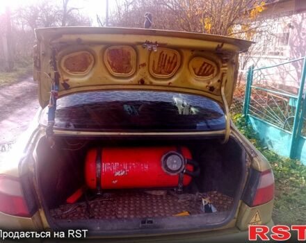 Желтый Дэу Ланос, объемом двигателя 1.4 л и пробегом 300 тыс. км за 1300 $, фото 6 на Automoto.ua