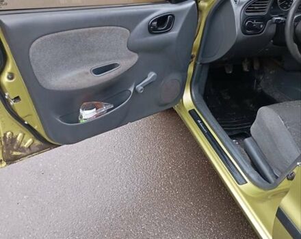 Желтый Дэу Ланос, объемом двигателя 1.39 л и пробегом 195 тыс. км за 2200 $, фото 11 на Automoto.ua