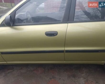 Желтый Дэу Ланос, объемом двигателя 1.5 л и пробегом 190 тыс. км за 1750 $, фото 5 на Automoto.ua