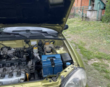 Желтый Дэу Ланос, объемом двигателя 1.5 л и пробегом 188 тыс. км за 2650 $, фото 10 на Automoto.ua