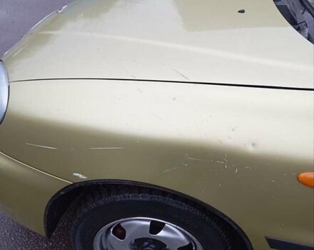 Желтый Дэу Ланос, объемом двигателя 1.39 л и пробегом 195 тыс. км за 2200 $, фото 10 на Automoto.ua