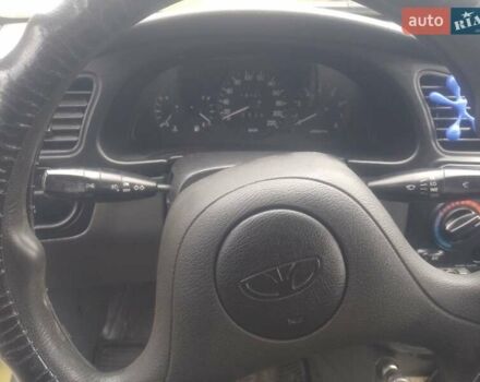 Желтый Дэу Ланос, объемом двигателя 1.5 л и пробегом 190 тыс. км за 1750 $, фото 23 на Automoto.ua