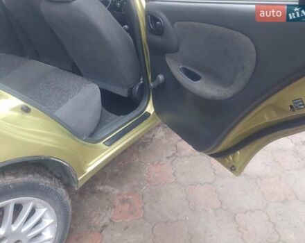 Желтый Дэу Ланос, объемом двигателя 1.5 л и пробегом 190 тыс. км за 1750 $, фото 17 на Automoto.ua
