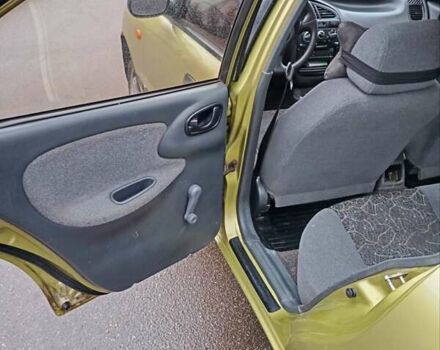 Желтый Дэу Ланос, объемом двигателя 1.39 л и пробегом 195 тыс. км за 2200 $, фото 13 на Automoto.ua