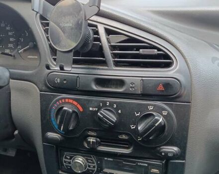 Желтый Дэу Ланос, объемом двигателя 1.5 л и пробегом 244 тыс. км за 1490 $, фото 2 на Automoto.ua